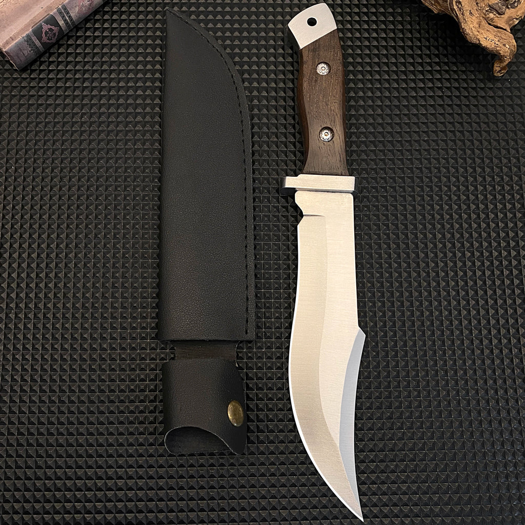 Stainless steel hunting knife with a wooden handle, paired with a black leather sheath, an essential tool for adventurers